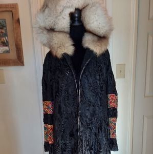 Broadtail full length coat with embroidery detailing.